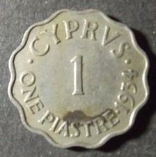 CYPRUS 1 PIASTRE SCALLOPED COIN DATED 1934 A LITTLE GRUBBY