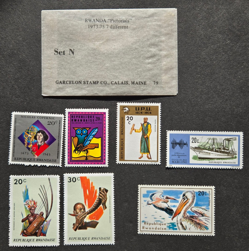 Rwanda, 1973-75, 7 different stamps, includes glassine envelope STLC