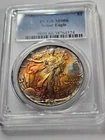 🌟 1986 1 oz $1 American Silver Eagle Coin PCGS MS66 1st Year ORANGE/RED TONED