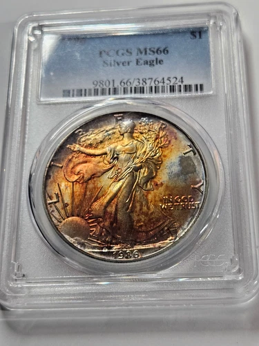 🌟 1986 1 oz $1 American Silver Eagle Coin PCGS MS66 1st Year ORANGE/RED TONED