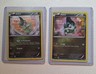 2 basic  Axew holo pokemon cards in excellent condition.
