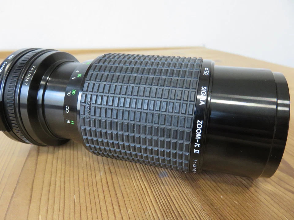 Objectif SIGMA ZOOM KII - 1 : 4,5 F =70 - 210 mm pour Canon FD / Bouchons /Etui - Photo 2/4