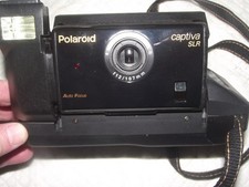 POLAROID CAPTIVA SLR, INSTANT FILM AUTO FOCUS CAMERA WITH STRAP