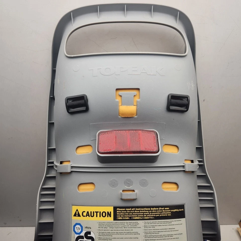 Asiento de bebé Topeak con seguridad envolvente naranja, gris claro Foto 4 de 4