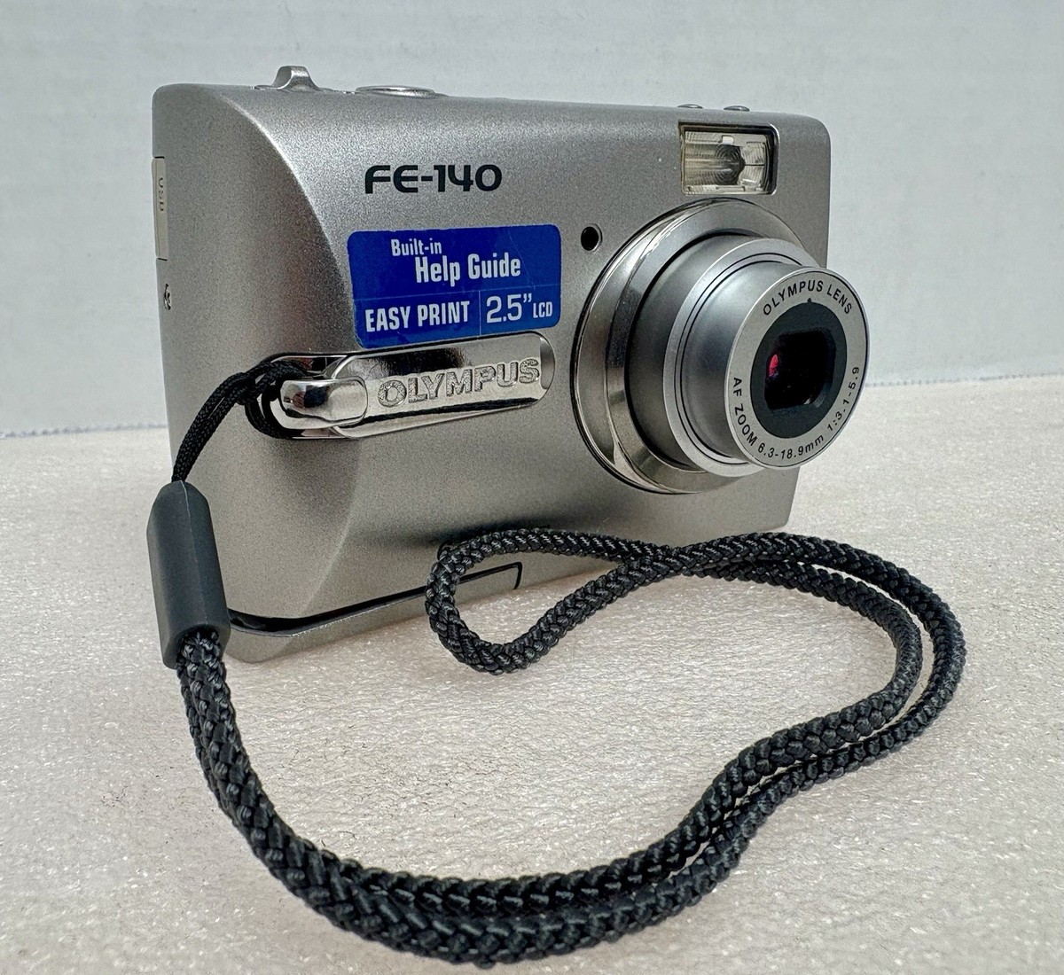 Olympus FE-140 6.0MP Digital Camera Silver With Picture Card