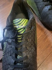 Used Black and Neon Green Soccer Cleats