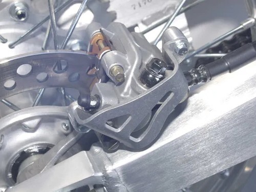Works Al Rear Brake Caliper Guard for Suzuki RM125 95-00 - Picture 2 of 5