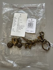 NWT COACH 1941 REXY  CARRIAGE LARGE BRASS BAG CHARM 24011 RARE 