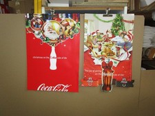 coca cola posters.  2 x different Xmas posters. there are 4 of each in this lot.