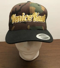 The Classic Yupoong Venice Kush Camo Black Bill Snapback Hat Size O/S
