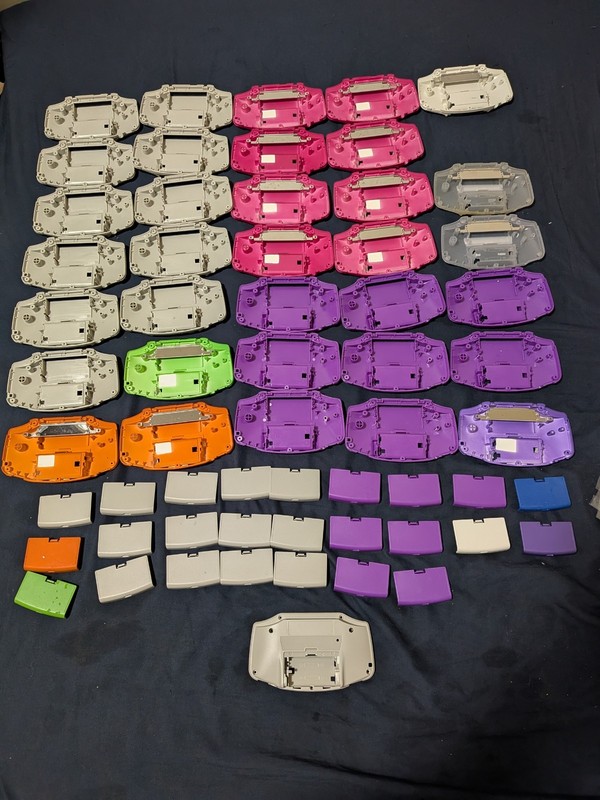 GBA Back Plates Bulk Lot – 35 Shell Parts, 25 RetroSix USB-C Battery Door Spring