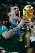 IKER CASILLAS SIGNED SPAIN 2010 WORLD CUP WINNERS 12X8 PHOTO (ACG CERT AG17161)