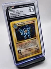 Machamp - Pokemon Base Set 1st Edition Shadowless Holo 8/102, NM/Mint+ (CGC 8.5)