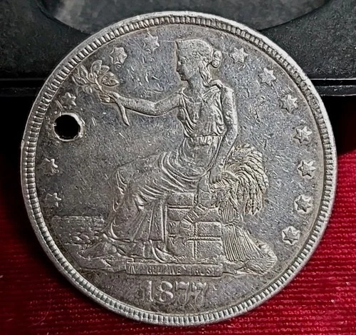 1877-P $1 Trade Dollar Holed