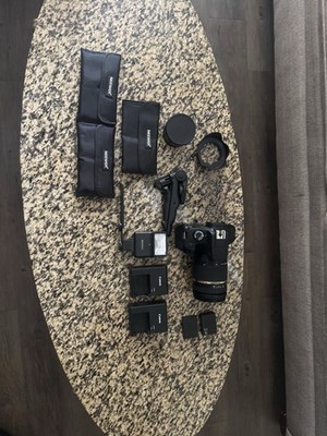 Canon T100 w/camera bag & accessories