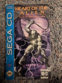 Heart of the Alien (SEGA CD) case and manual. Disc is damaged