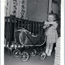 c1950s Cute Toddler Girl Snapshot Photo Toy Doll Buggy Pram Plaid Dress Crib Vtg