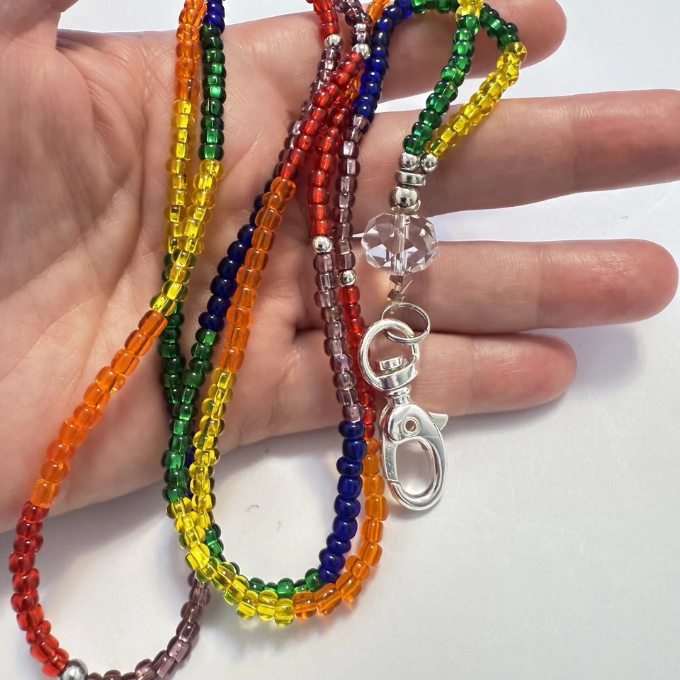 Llavero con cordón arco iris hecho a mano para mujeres hombres collar con cuentas de vidrio insignia de identificación Foto 2 de 4