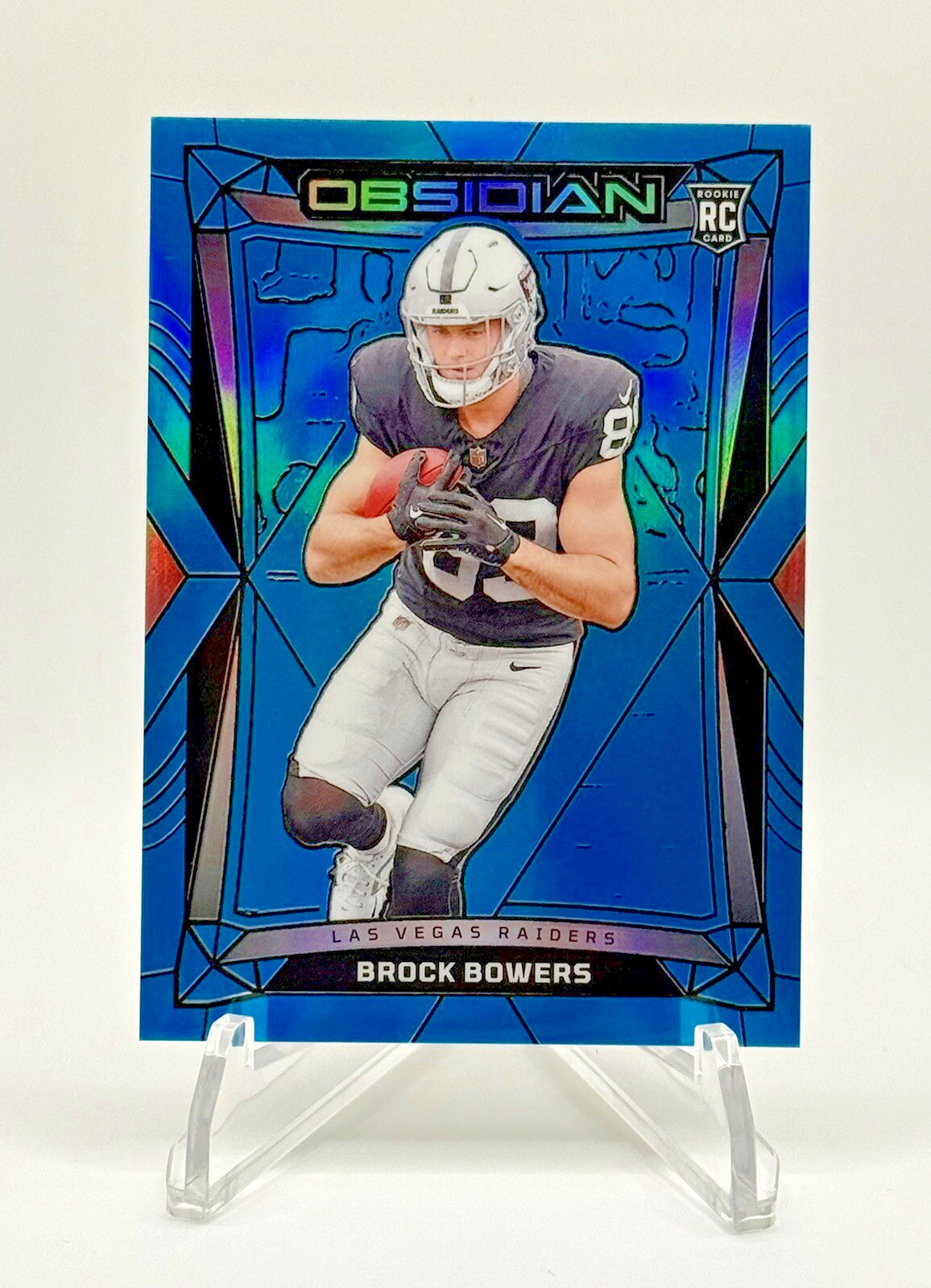 2024 Panini Obsidian Brock Bowers #101 - BLUE /25 - (RC)