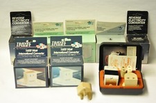 Group of international electrical converters as shown. New old stock.