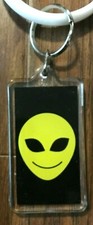 Alien Emoji Yellow Smile Face Key Chain / Keyring NOS Black Background UFO Guy