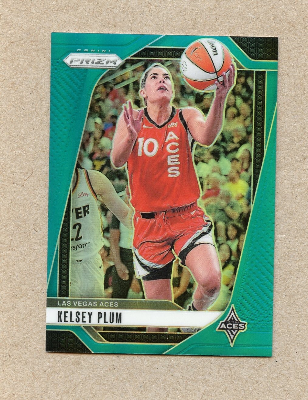 2024 Panini WNBA Prizm Kelsey Plum #77 Teal Prizm 31/49 Las Vegas Aces