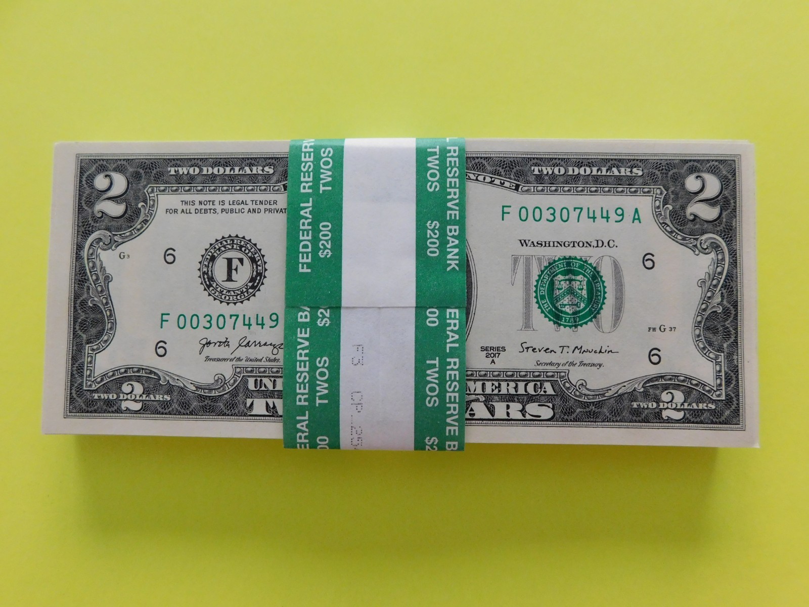 Lot of 100 US $2 Two Dollar Bills Low Serial Numbers BEP Money Pack brand new.