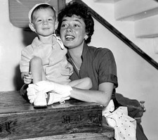 Actress Ruth Roman and her son Richard get an eyeful of the scener .. Old Photo