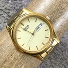 Vintage Seiko Men 7N43-9048 Lumibrite Day Date Gold Tone36mm Watch 6 3/4"