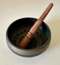 Tibetan singing bowl with wooden mallet