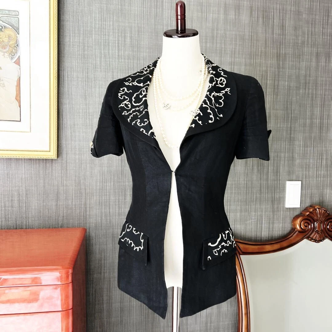 Giacca CHANEL Coco Mark bottoni manica corta nera estiva donna