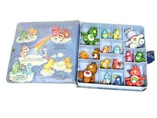 LOT OF 16 VINTAGE 1980'S CARE BEAR PVC FIGURINES IN CARRYING CASE GOOD CONDITION