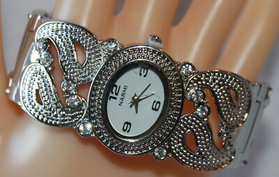 Silver Narmi Cuff Watch, clear rhinestones, quartz movement, spring hinge