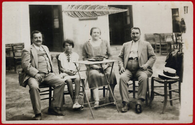 #22991 Greece Two men, a woman a girl in a cafe Photo  RPPC