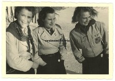 Genuine Photo youth girl with city coat of arms on sports jacket