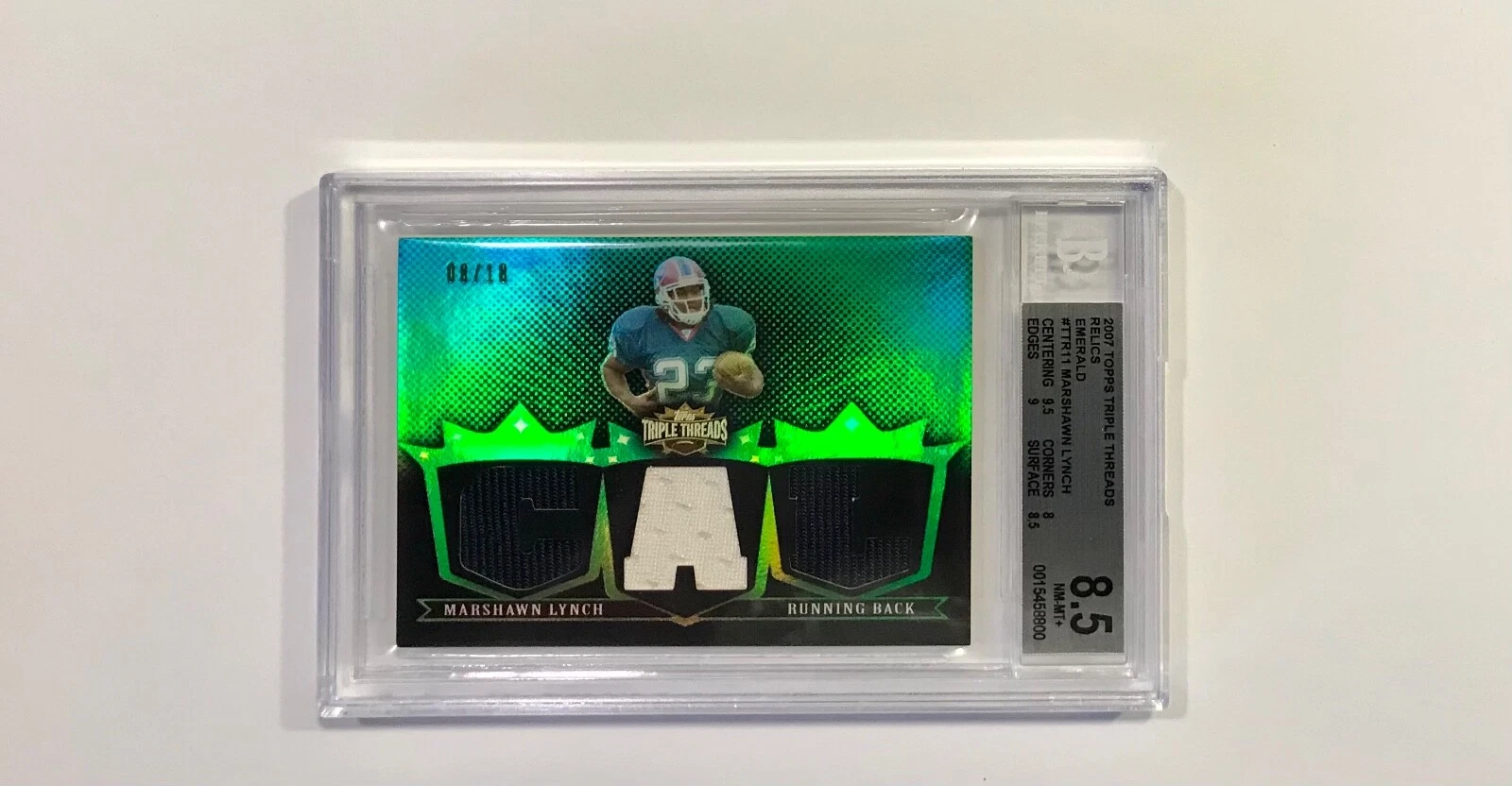 Marshawn Lynch Topps Triple Threads Autograph Relic #122 Emerald