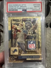 2022 Donruss Optic Amon-Ra St. Brown Donruss Threads Gold Vinyl 1/1 - NFL Shield