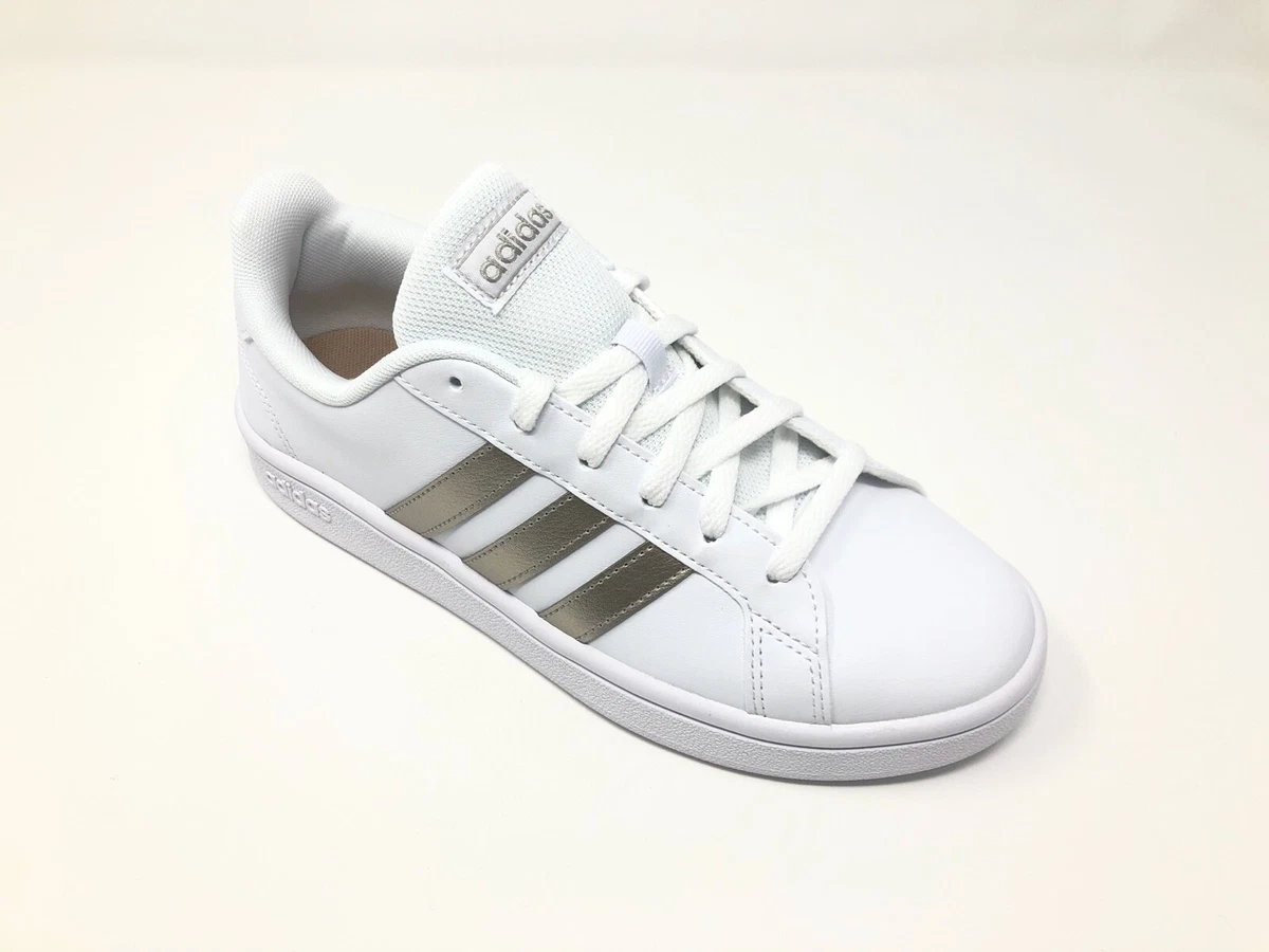 Scarpe adidas store strisce oro