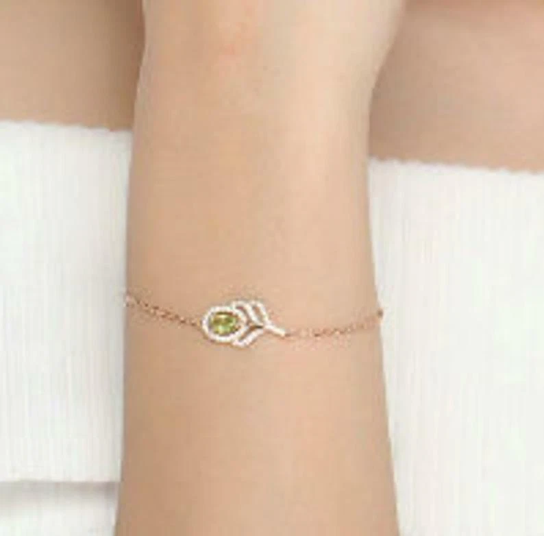 Oval Cut Green Peridot With Sparklign CZ Classic Leaf 14k Rose Gold Bracelets - Image 4 of 4