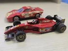 Solido Marlboro Lancia Stratos and Minichamps Marlboro Ferrari F1 1/43