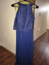 Blue evening gown, with embroidery in excellent condition size S/P.