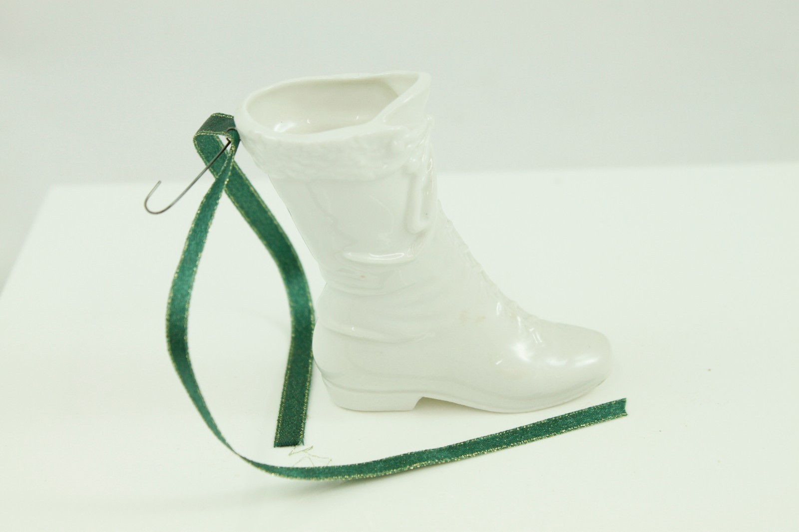 Vintage White Ceramic Boot Christmas Ornament for Festive Holiday Tree Decoration and Cozy Seasonal Ambiance