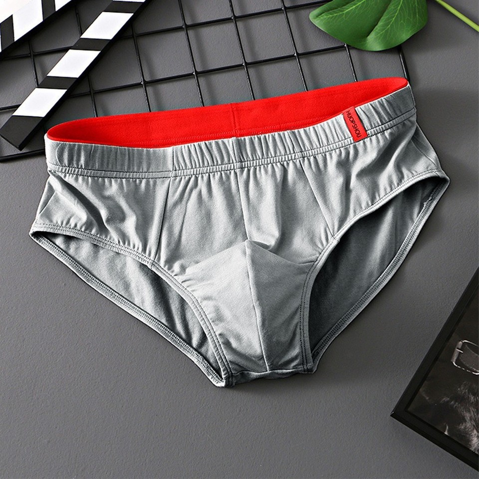 Slip Sissy pour homme avec poche bombée, design creux et élastique