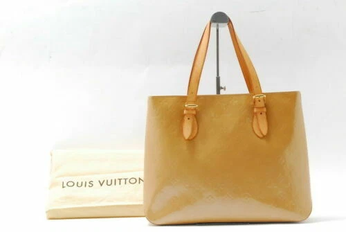 Sacs et sacs à main beige Louis Vuitton pour femme