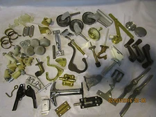 assortment of vintage hardware swivel wheels hooks brackets hinges latches etc