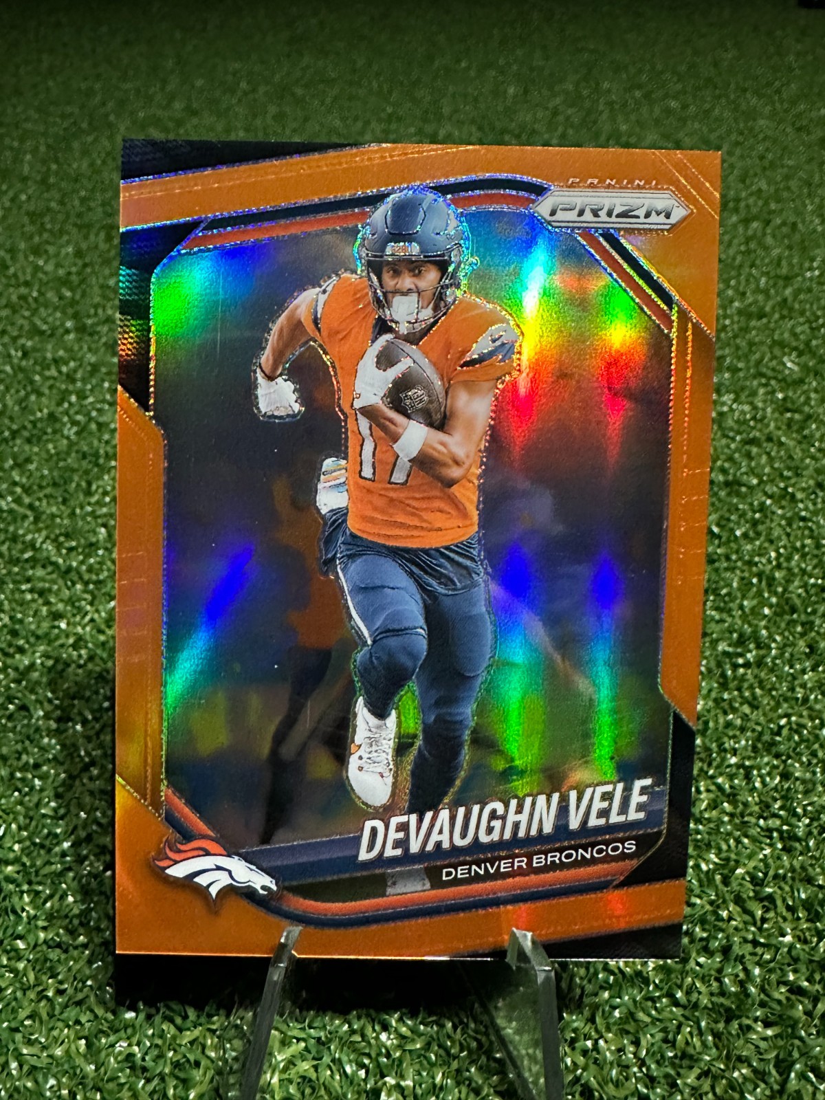 2025 Panini Prizm - Devaughn Vele #54 Orange Prizm /249 Color Match