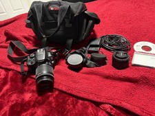 Canon EOS Rebel SL1 18.0MP Digital SLR Camera - Black Kit with 18-55mm STM...