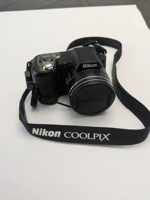 Nikon Coolpix L100 Black 10 MP Point Shoot Digital Camera   Works New Batteries