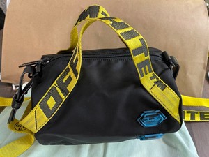 off white duffle bag