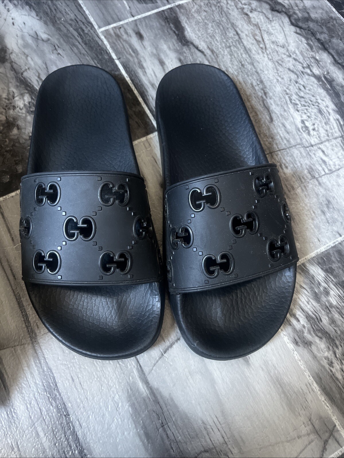 Gucci logo-embossed luxury slides for men and women-image